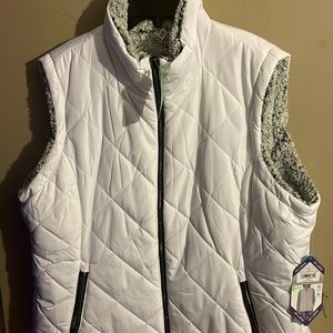 A white winter vest, it’s comfy on the inside.